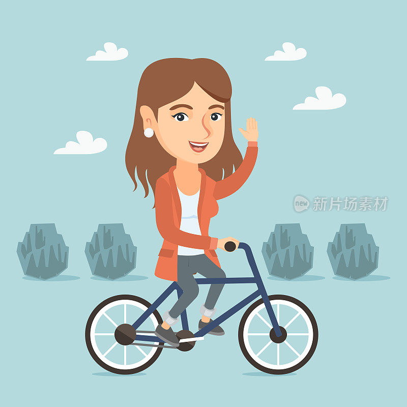 Young caucasian woman riding bicycle in the park